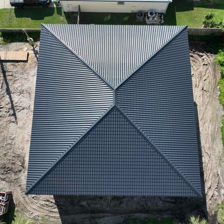 "Top view of Elite Steel's high-quality metal roofing panels installed in the scenic Florida area, showcasing durability and style for residential, commercial, and agricultural buildings."