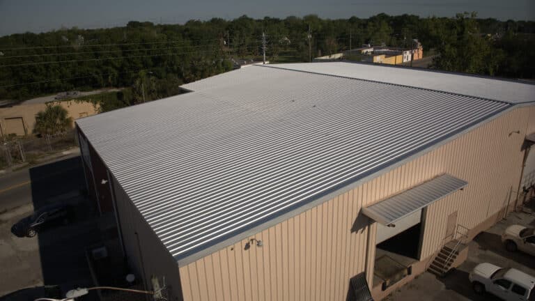 Elite Steel metal roofing panels installed on a new commercial building in Florida, showcasing durability and sleek design.