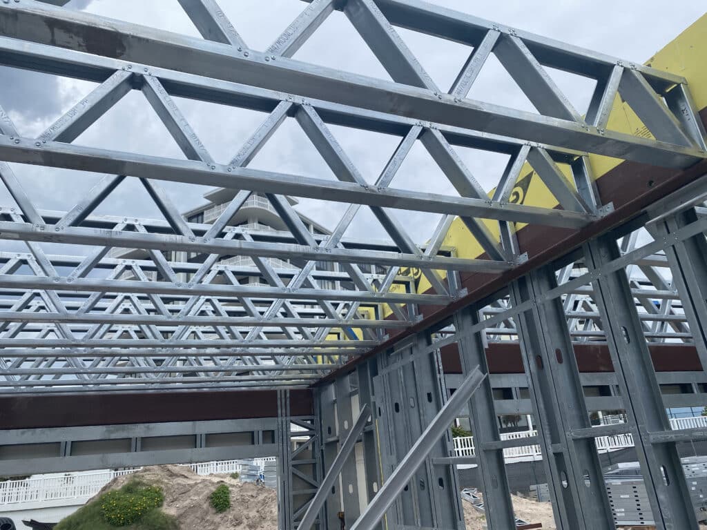 Light gauge steel framing showing our Studs and tracks being used in commercial building in florida. Elite Steel