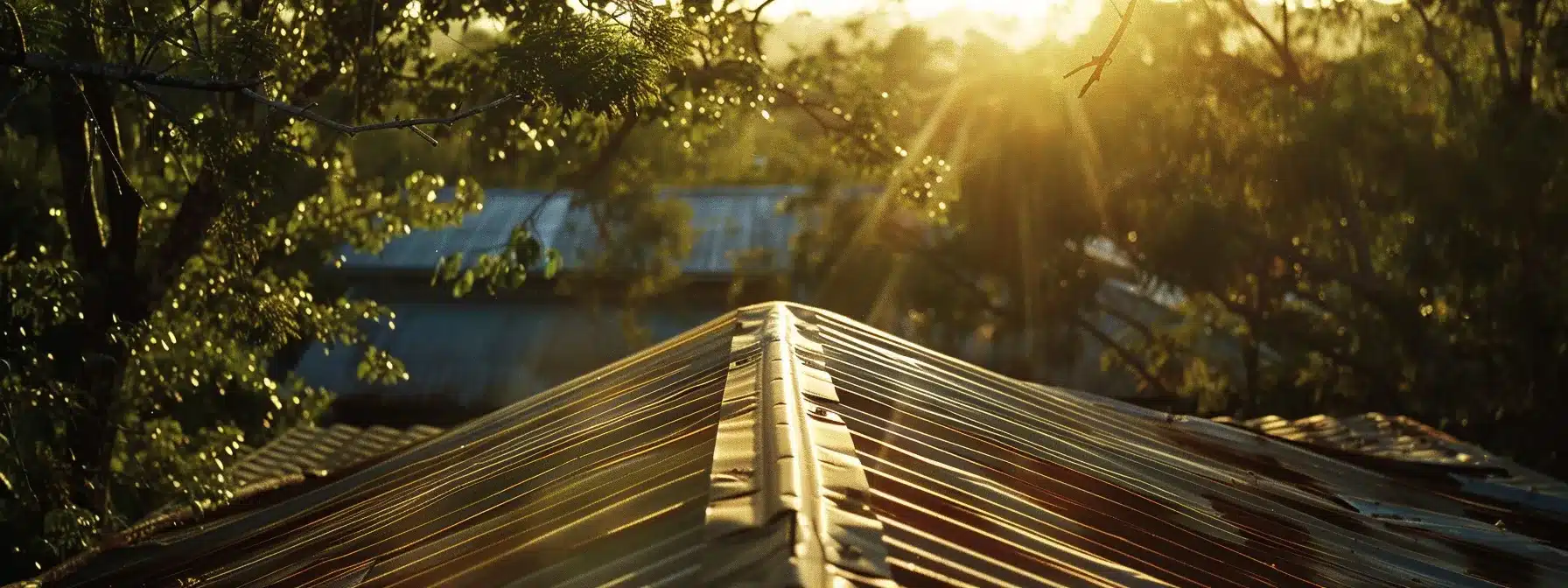 a rooftop covered in shiny, well-maintained corrugated metal glistening under the florida sun, showcasing the importance of regular inspections and upkeep.