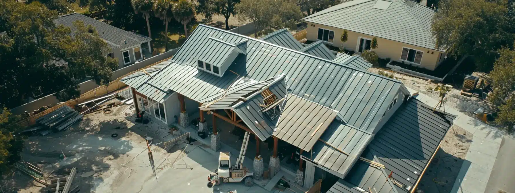 a sturdy metal roof being securely fastened on a well-insulated florida home, ensuring durability and energy efficiency.